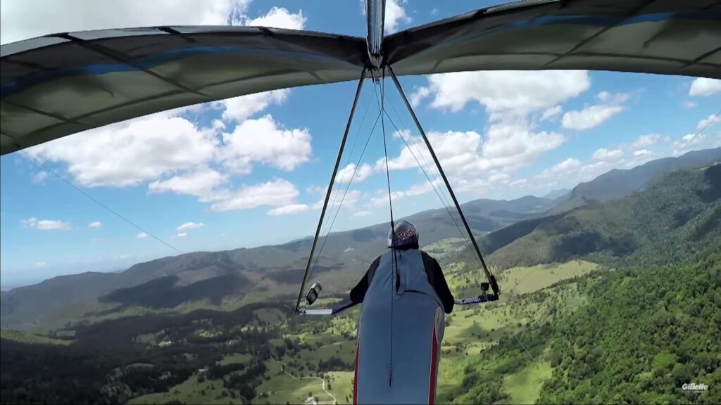 Human flying on a hang glider